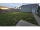 Fenced backyard with a grass lawn and a storage shed at 209 Killarney Trl, Moncks Corner, SC 29461