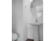 Bathroom with pedestal sink, modern fixtures, and a white color scheme at 209 Killarney Trl, Moncks Corner, SC 29461