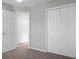 Bedroom includes a spacious closet with bi-fold doors and an open doorway to another room at 209 Killarney Trl, Moncks Corner, SC 29461