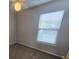 Bedroom with wall to wall carpeting and a bright window with blinds at 209 Killarney Trl, Moncks Corner, SC 29461