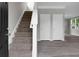 Home entryway featuring neutral walls, a staircase, and modern flooring at 209 Killarney Trl, Moncks Corner, SC 29461