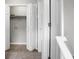 Hallway view of bi-fold closet doors with a laundry area featuring washer hookups at 209 Killarney Trl, Moncks Corner, SC 29461