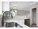 Kitchen area featuring stainless steel appliances, light countertops, and a pantry at 209 Killarney Trl, Moncks Corner, SC 29461