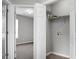 Bright laundry area features tile flooring, neutral walls, shelving, and washer/dryer hookups at 209 Killarney Trl, Moncks Corner, SC 29461