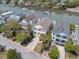 Lovely aerial view of neighborhood homes along the water and private docks at 21 Morgan Place Dr, Isle of Palms, SC 29451