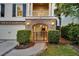 Attractive home showcasing a brick archway leading to a gated entrance at 21 Morgan Place Dr, Isle of Palms, SC 29451