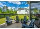 Backyard with Adirondack chairs on a patio and a fenced in yard at 2282 Braided Ln, Mount Pleasant, SC 29466