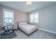 Bright bedroom features a large window, desk, and light neutral tones at 2282 Braided Ln, Mount Pleasant, SC 29466