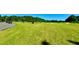Beautiful golf course with lush green grass and a view of golfers enjoying the course at 2282 Braided Ln, Mount Pleasant, SC 29466