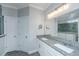 Bathroom with granite countertops, double sinks, and a large mirror at 2302 Hamlin Sound Cir, Mount Pleasant, SC 29466