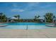 Large swimming pool with lounge chairs and umbrellas available for residents to enjoy at 2302 Hamlin Sound Cir, Mount Pleasant, SC 29466