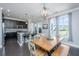 Bright dining room featuring modern finishes, hardwood floors and lots of natural light at 2302 Hamlin Sound Cir, Mount Pleasant, SC 29466
