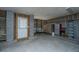 Organized garage space with workbench, tools, and ample storage, ideal for DIY projects at 2302 Hamlin Sound Cir, Mount Pleasant, SC 29466