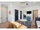 A relaxing second floor landing zone with TV, chairs and view of the Primary suite at 2568 Helmsman Rd, Johns Island, SC 29455