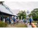 Community clubhouse with outdoor seating areas and ample space for gatherings at 2568 Helmsman Rd, Johns Island, SC 29455
