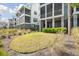 Beautiful townhome with multiple screened porches and a manicured lawn area at 2568 Helmsman Rd, Johns Island, SC 29455