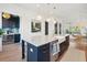 Open kitchen featuring a marble countertop island, bar and view to bar and living area at 2568 Helmsman Rd, Johns Island, SC 29455
