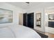 Spacious main bedroom with an ensuite bathroom, featuring a ceiling fan and modern decor at 2568 Helmsman Rd, Johns Island, SC 29455