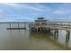 Picturesque view of a community dock and gazebo on the water, perfect for enjoying waterfront living at 2668 Private Lefler Dr, Johns Island, SC 29455