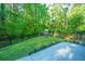 Backyard with a fun playground area, featuring swings and a slide, perfect for entertainment at 2668 Private Lefler Dr, Johns Island, SC 29455