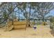Community playground featuring a large pirate ship play structure with slides, promoting active outdoor fun at 2668 Private Lefler Dr, Johns Island, SC 29455