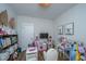 Playroom featuring play kitchen, table, and dress-up station for imaginative play at 2668 Private Lefler Dr, Johns Island, SC 29455