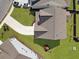 Aerial view of a home with a well-manicured lawn, long driveway, and a play structure in the backyard at 2889 Backman St, Mount Pleasant, SC 29466