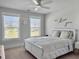 Charming bedroom with two windows for natural light and a ceiling fan at 2889 Backman St, Mount Pleasant, SC 29466