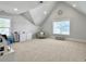 Large bonus room with natural light, neutral decor, and a variety of storage options at 2889 Backman St, Mount Pleasant, SC 29466