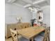 Bright dining room with a tray ceiling, stylish light fixture, and neutral decor at 2889 Backman St, Mount Pleasant, SC 29466