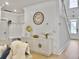 Charming entryway with a mudroom, white console table, and views of the staircase at 2889 Backman St, Mount Pleasant, SC 29466