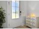 Bright entryway featuring decorative chest, a front door with glass, and neutral paint at 2889 Backman St, Mount Pleasant, SC 29466