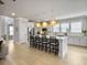Spacious kitchen with a large island, pendant lighting, and stainless steel appliances at 2889 Backman St, Mount Pleasant, SC 29466