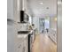 Modern kitchen featuring stainless steel appliances, white cabinetry, and sleek countertops at 2889 Backman St, Mount Pleasant, SC 29466