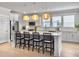 Stylish kitchen featuring a large island with bar seating and modern lighting at 2889 Backman St, Mount Pleasant, SC 29466