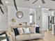 Cozy living space with shiplap accent wall, stylish decor, and comfortable seating arrangement at 2889 Backman St, Mount Pleasant, SC 29466