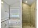 Luxurious bathroom with a soaking tub and walk-in shower; lots of natural light at 2889 Backman St, Mount Pleasant, SC 29466