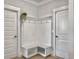 Bright mudroom featuring a built-in bench, coat hooks, and storage, perfect for organizing outerwear and accessories at 2889 Backman St, Mount Pleasant, SC 29466