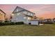 Backyard featuring a patio area with a fire pit, seating, an outdoor kitchen, and a screened porch at 2906 Quarterdeck Ct, Mount Pleasant, SC 29466