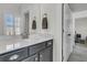 Bathroom with single vanity, marble counters, and a view to a bedroom at 2906 Quarterdeck Ct, Mount Pleasant, SC 29466