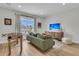 Cozy living room with a sofa, foosball table and natural light from the windows at 2906 Quarterdeck Ct, Mount Pleasant, SC 29466