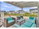 Outdoor patio with plush seating and a view of the manicured yard and neighborhood at 2906 Quarterdeck Ct, Mount Pleasant, SC 29466
