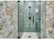 Stylish walk-in shower with designer tile, glass door, and modern fixtures at 2906 Quarterdeck Ct, Mount Pleasant, SC 29466