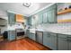 Stylish kitchen features shaker cabinets, stainless steel appliances, and elegant subway tile backsplash at 310 Land O Pines Cir, Moncks Corner, SC 29461