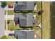 Birds-eye view of a home featuring a backyard patio with shade, a well-kept lawn, and lush surroundings at 3133 Cold Harbor Way, Charleston, SC 29414