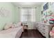 Cozy bedroom with a twin bed, a bright window and a decorative shelf, perfect for a room at 3133 Cold Harbor Way, Charleston, SC 29414