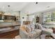 Open-concept living space showcasing a kitchen, dining area, and comfortable seating area with stylish decor at 3133 Cold Harbor Way, Charleston, SC 29414