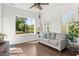 Cozy sunroom with large windows offering scenic views, and comfortable seating at 3133 Cold Harbor Way, Charleston, SC 29414