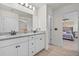 Bright bathroom featuring dual sinks, granite counters, and modern fixtures at 3149 Timberline Dr, Johns Island, SC 29455
