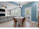 Open dining space with table set for four, with view of living room, and natural light at 3149 Timberline Dr, Johns Island, SC 29455